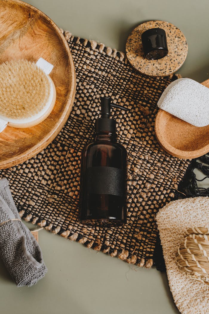 Mastering the First Impression: Your intriguing post title goes here Flat lay of natural skincare products and accessories on woven mat for body care.